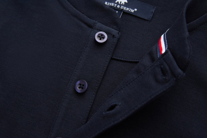 Navy grandad top detail with button placket and collar brand label