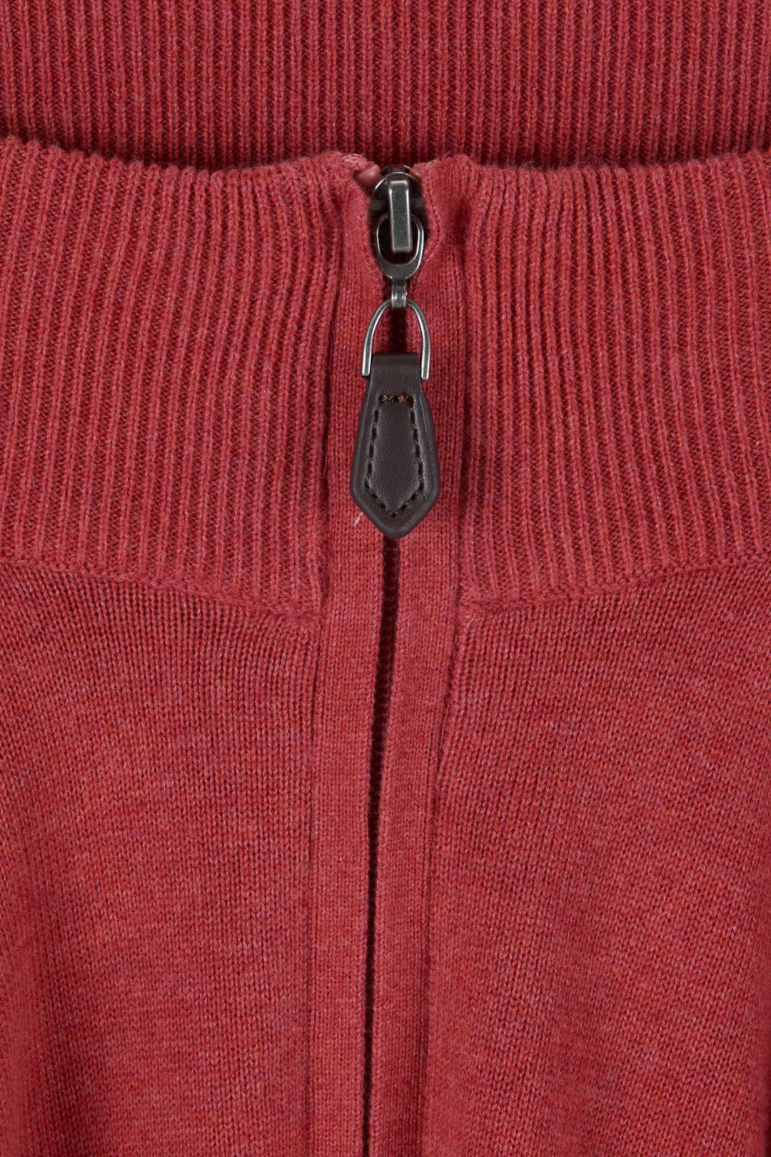 Coral quarter-zip knit with metal zip pull and leather-like tag