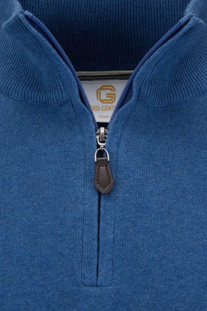 Blue knit 1/4-zip jumper with metal zipper and leather pull tab detail.