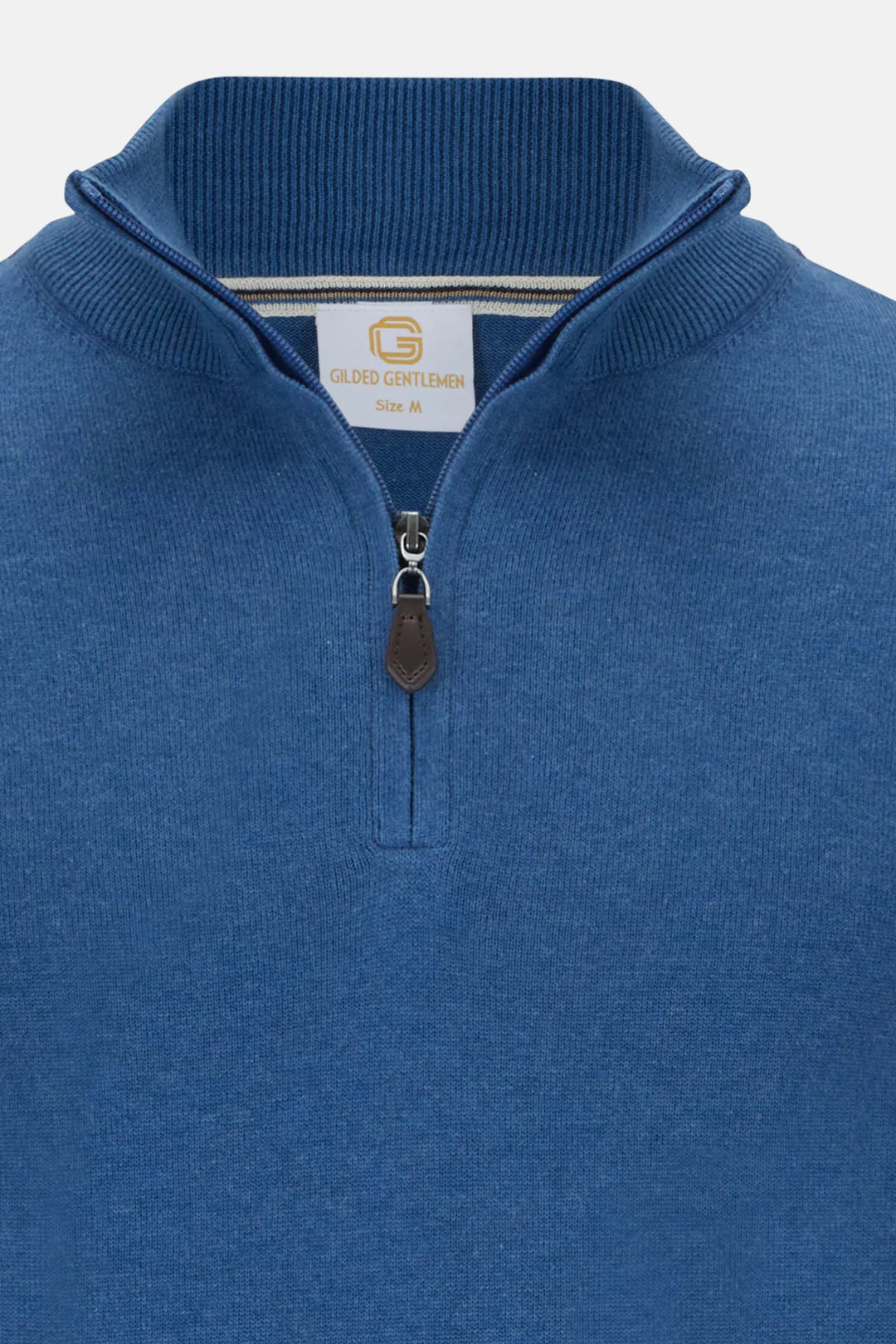 Blue knit 1/4-zip jumper with ribbed funnel collar and front zipper pull.
