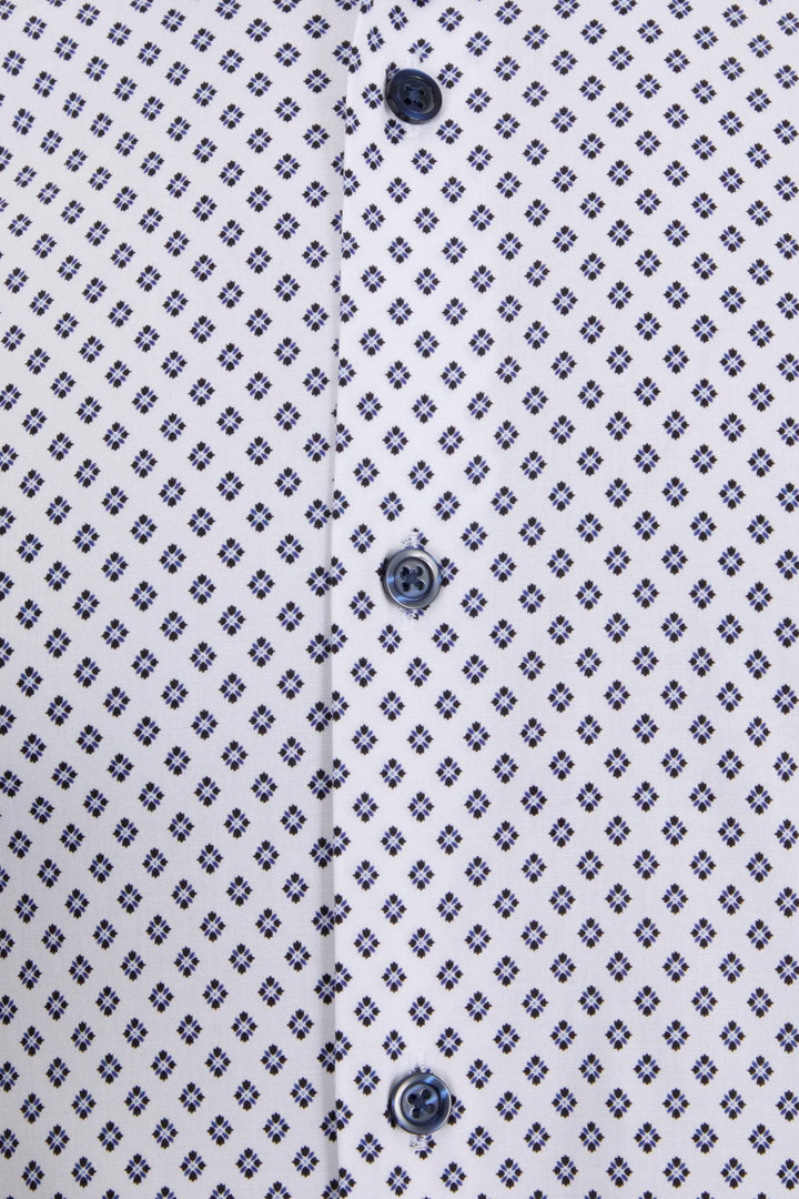 Men's dress shirt front closeup, navy patterned fabric and dark button placket.