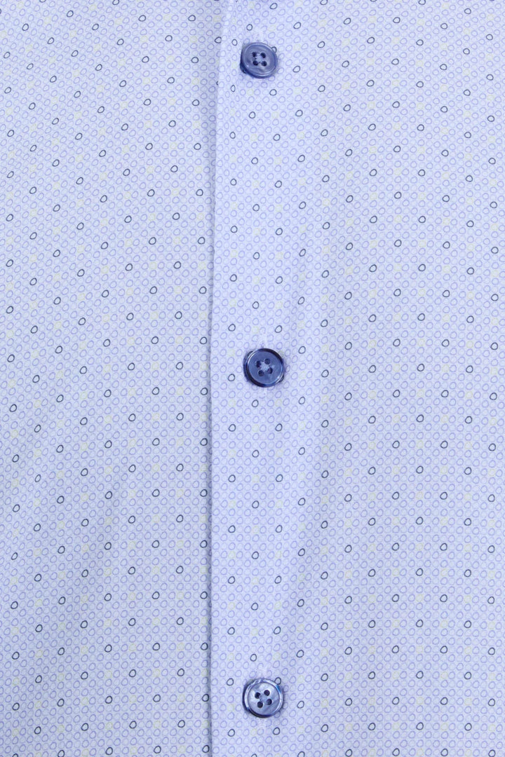 Light blue dress shirt fabric with small dotted print and button placket close-up.