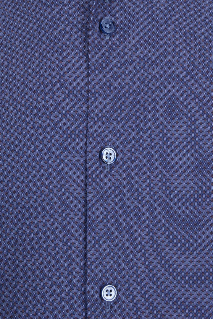 Close-up of blue dress shirt placket with three buttons and geometric pattern