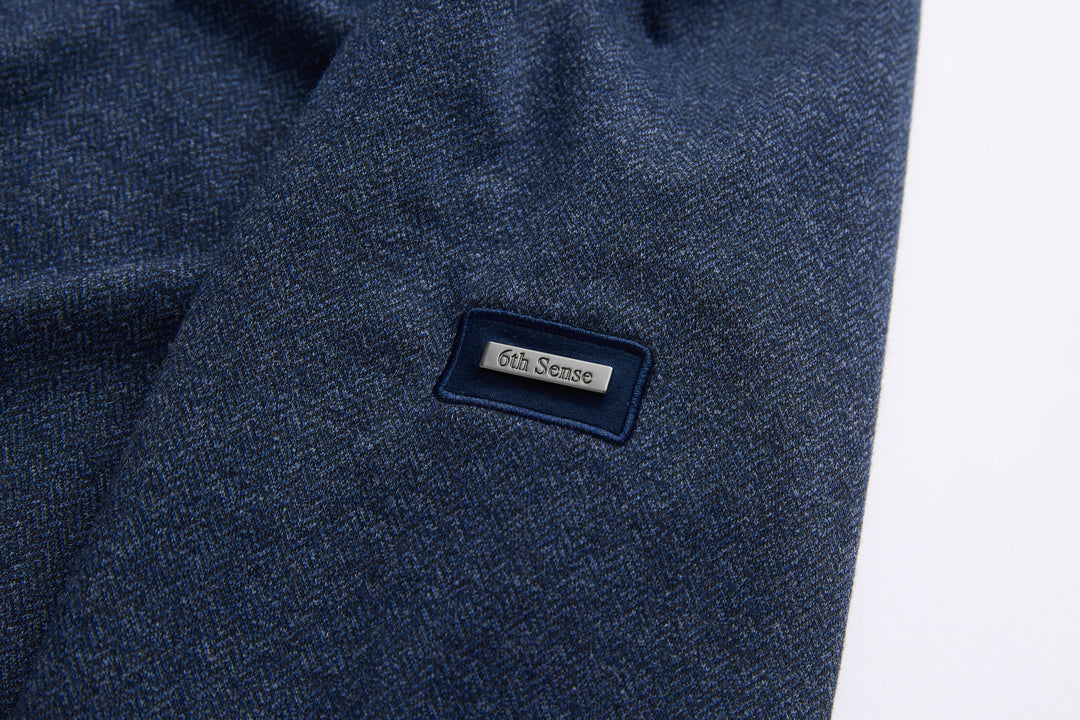 Dark blue herringbone 1/4-zip top chest label patch