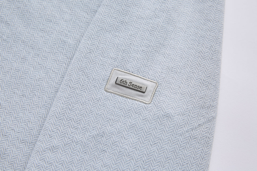 Grey herringbone 1/4-zip top with 6th Sense logo patch