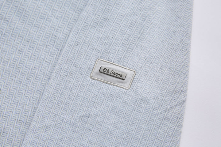 Grey herringbone 1/4-zip top with 6th Sense logo patch