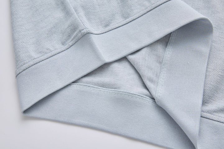 Grey herringbone 1/4-zip top ribbed neckline with inner facing