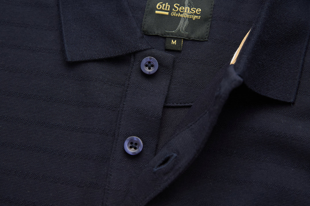 Dark navy polo shirt close-up: two buttons on placket and collar
