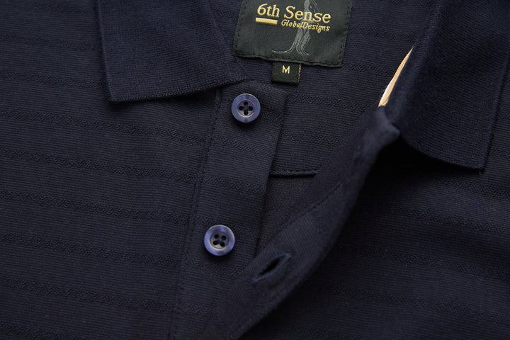 Dark navy polo shirt close-up: two buttons on placket and collar