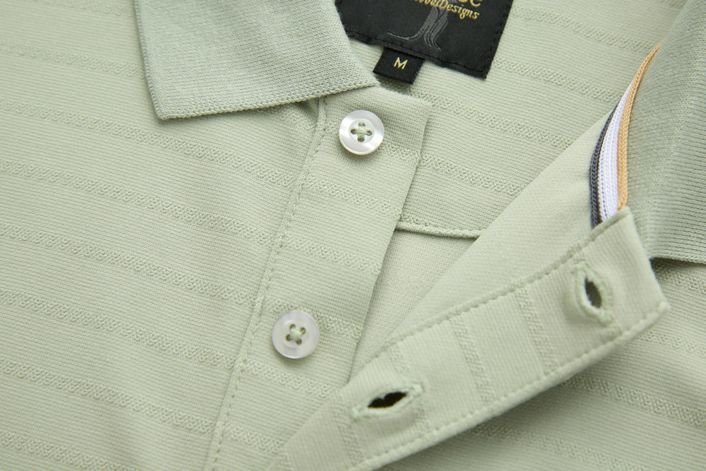 Sage polo shirt neckline and button placket detail with inner label