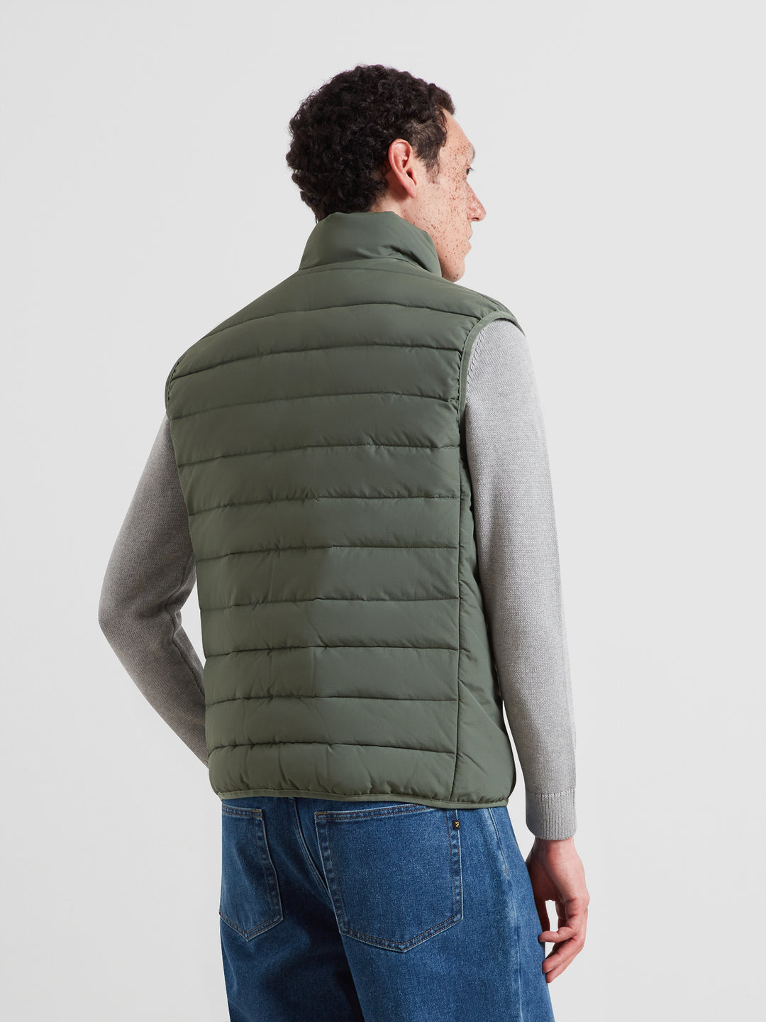 Farah Kennedy wadded gilet back view in rosemary olive green, quilted panel design