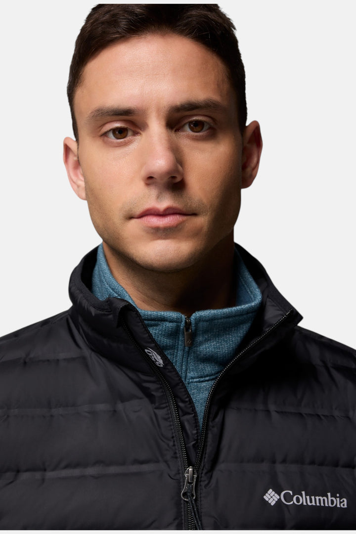 Black puffer down jacket detail, front zipper and Columbia logo on chest