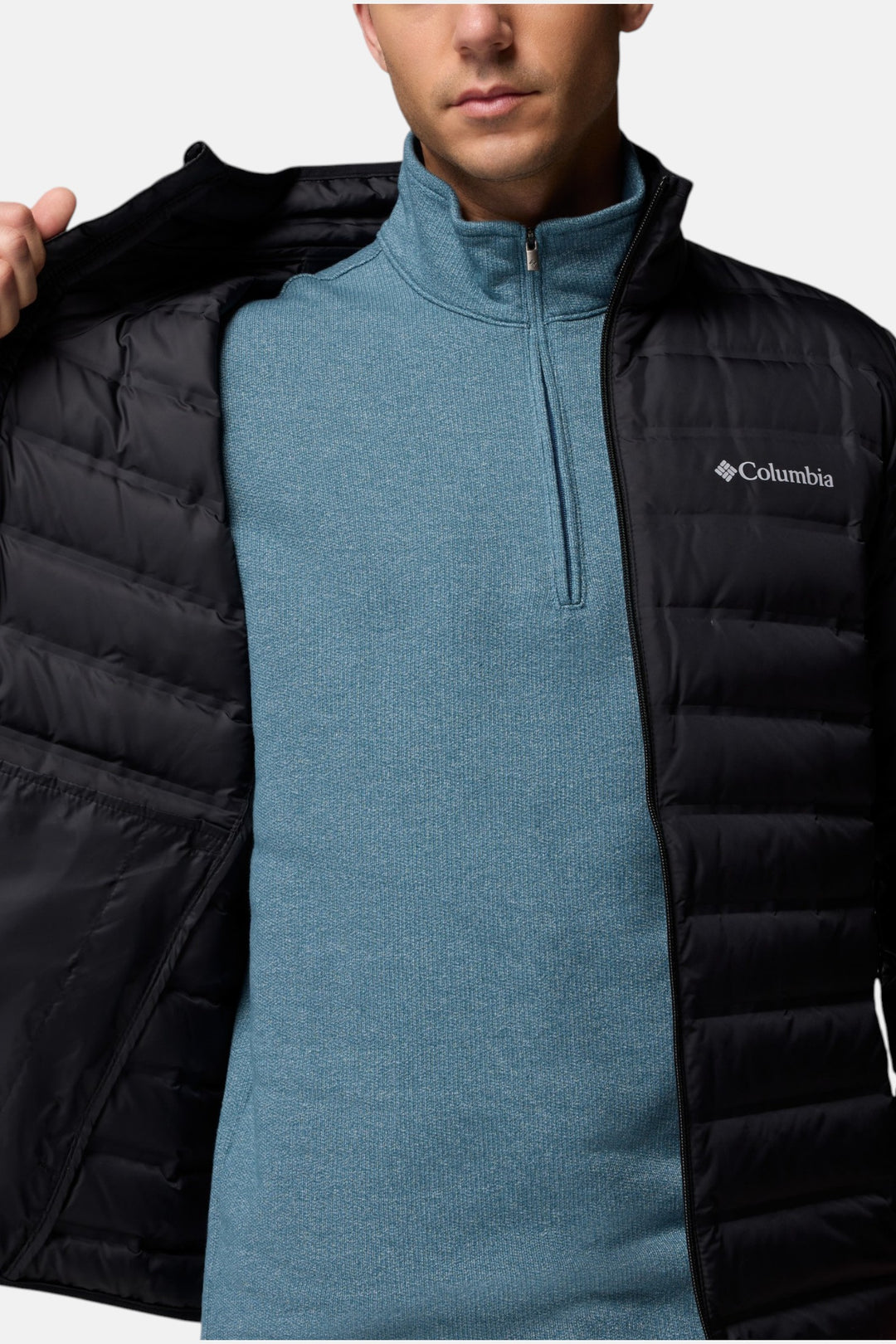 Black puffer down jacket with front zipper and stand collar, small chest logo