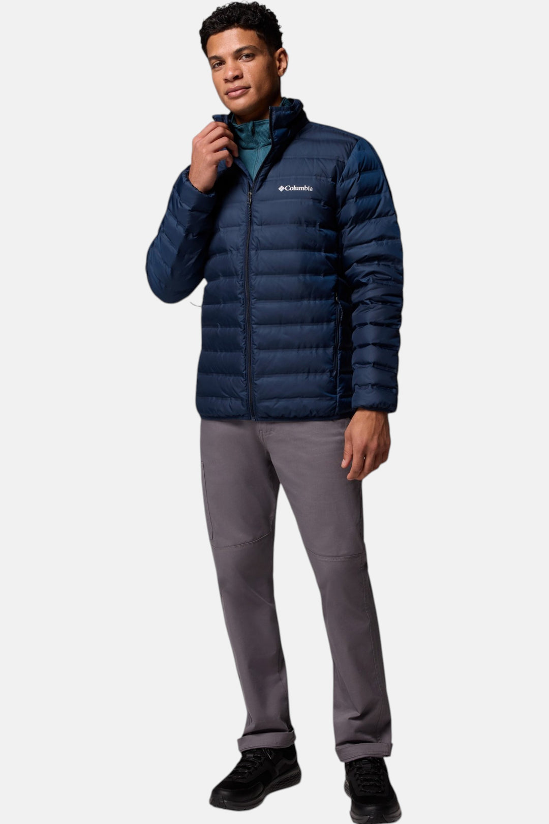 Men's navy down puffer jacket full outfit view with stand collar and zip closure