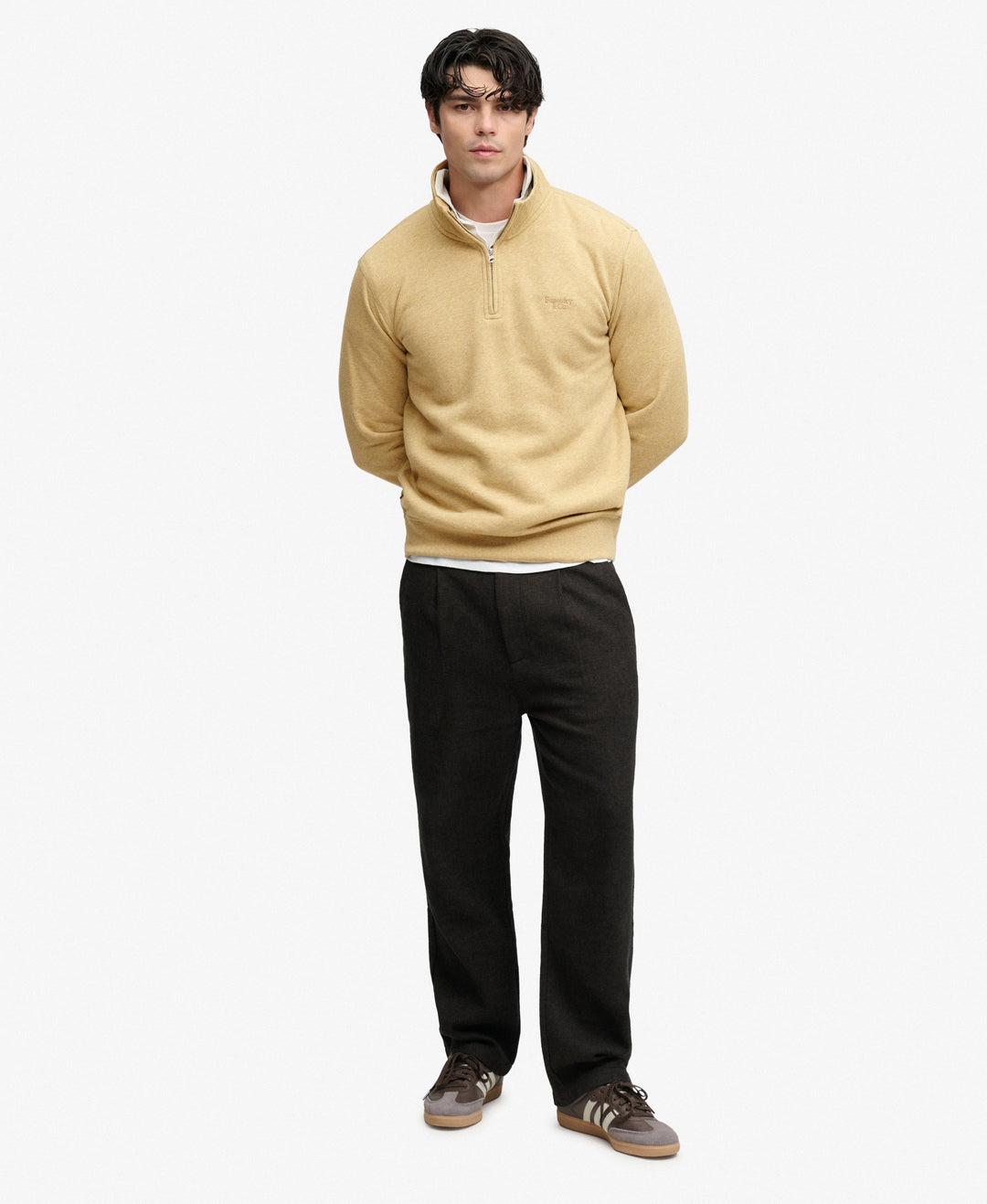 Men's tan half-zip knit top with ribbed hem and cuffs