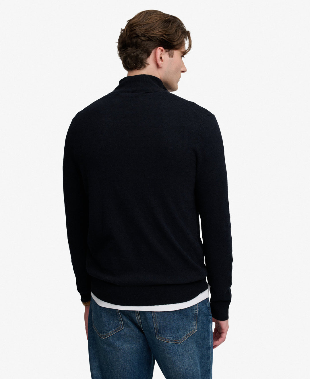 Navy half-zip sweater from back view, long sleeves and ribbed cuffs