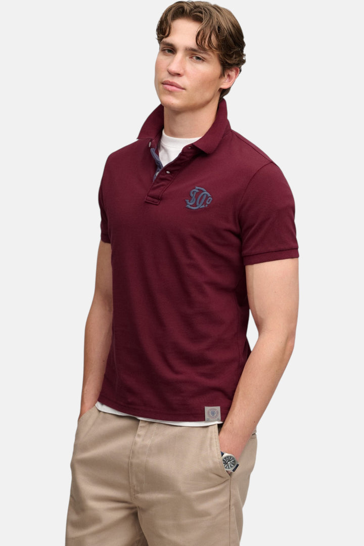 Port burgundy pique polo shirt with contrast collar and embroidered chest monogram