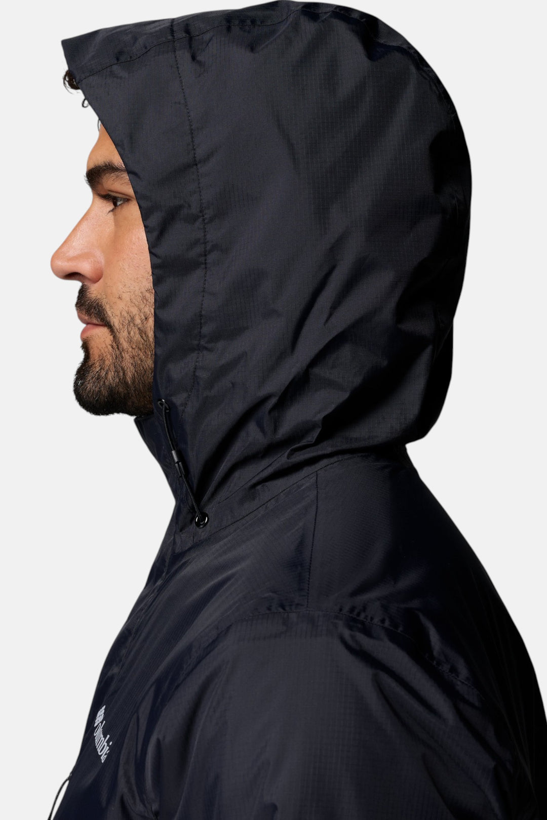 Men's waterproof hooded jacket with black shell and shaped hood for coverage
