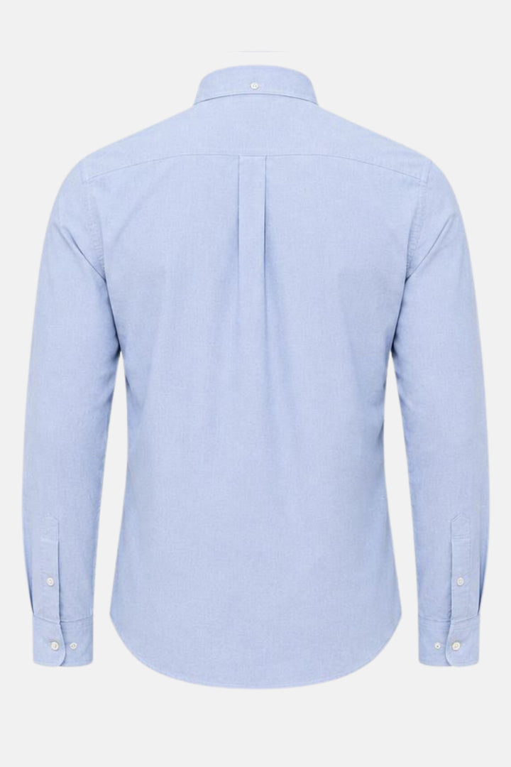 The back view of a light blue Rivet & Denim Oxford shirt available in size s-4xl.