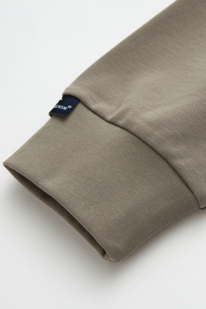 Grandad top sleeve cuff with a small side label