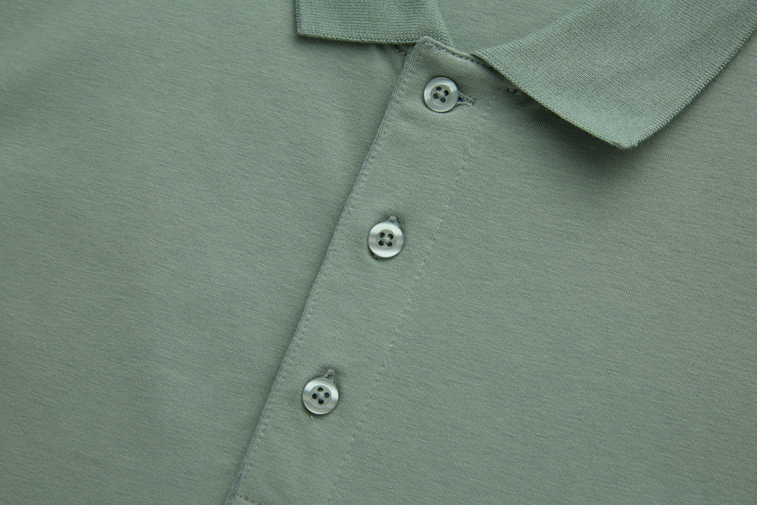 Mint polo shirt front view with three-button placket and collar