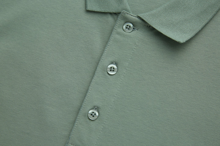 Mint polo shirt front view with three-button placket and collar