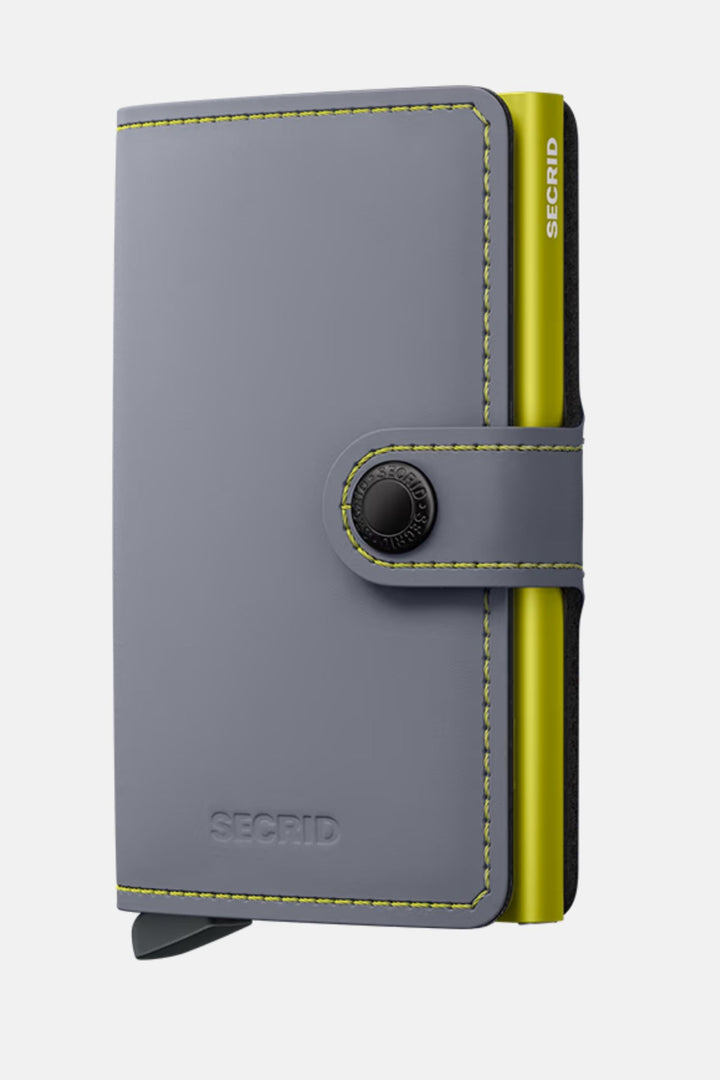 Secrid miniwallet in matte grey with lime edge and circular thumb loop