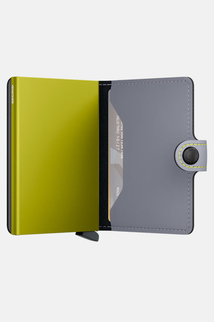 Secrid miniwallet open, lime interior and matte grey card holder panel