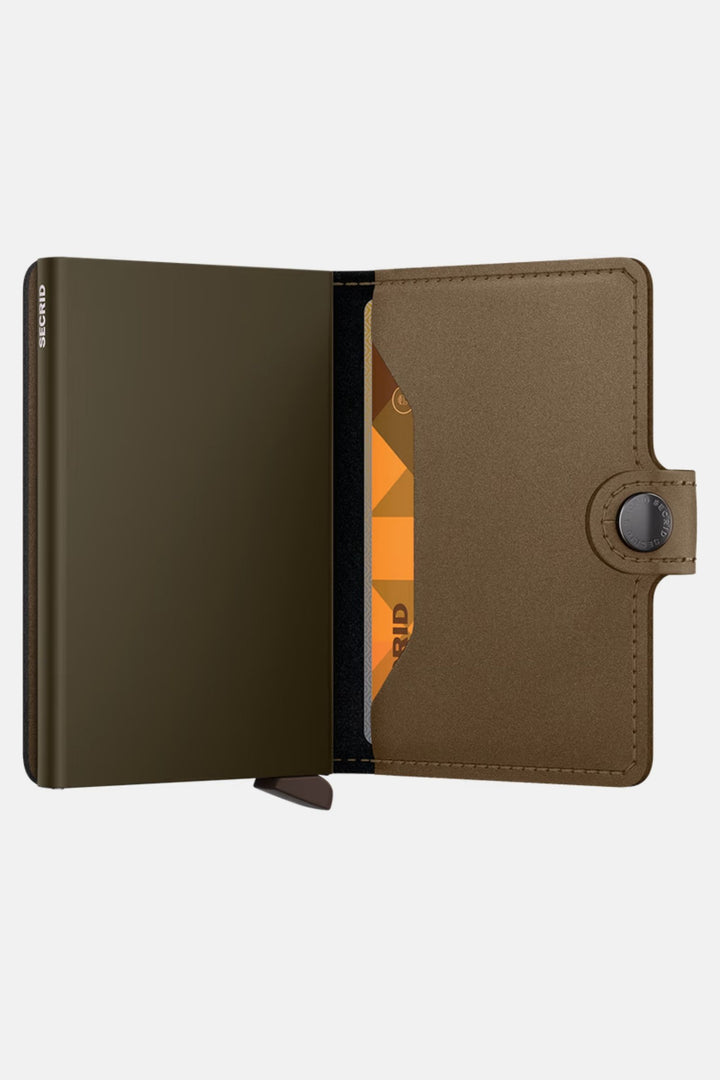 Secrid miniwallet in satin bronze, open view with card slots and side strap