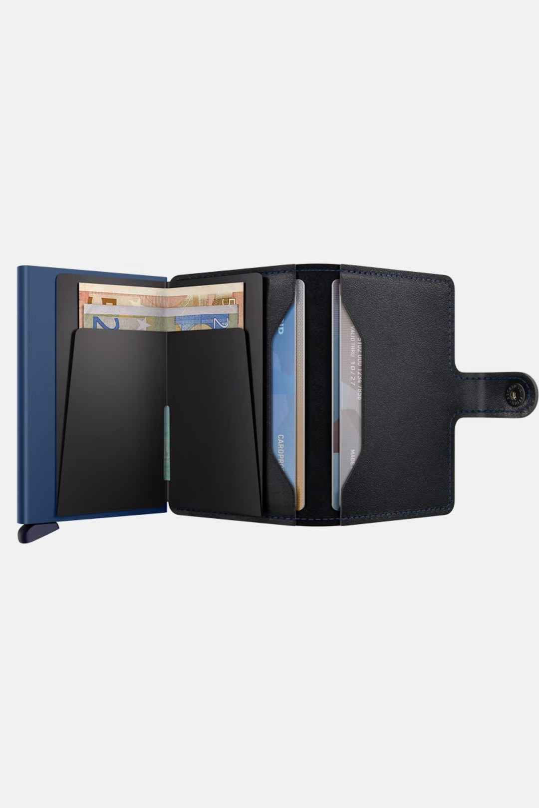 Secrid mini wallet open with card slots and black cover over navy interior