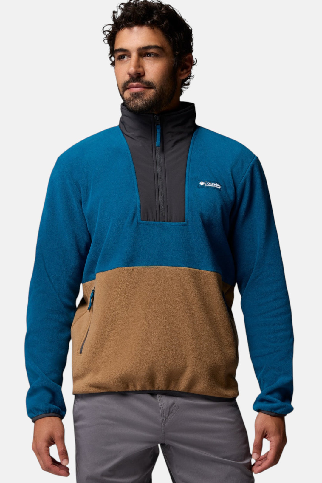 Men's blue half-zip fleece pullover with tan front panel and dark gray collar
