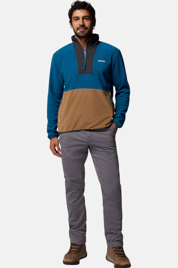 Men's blue and tan half-zip fleece pullover with stand collar and long sleeves