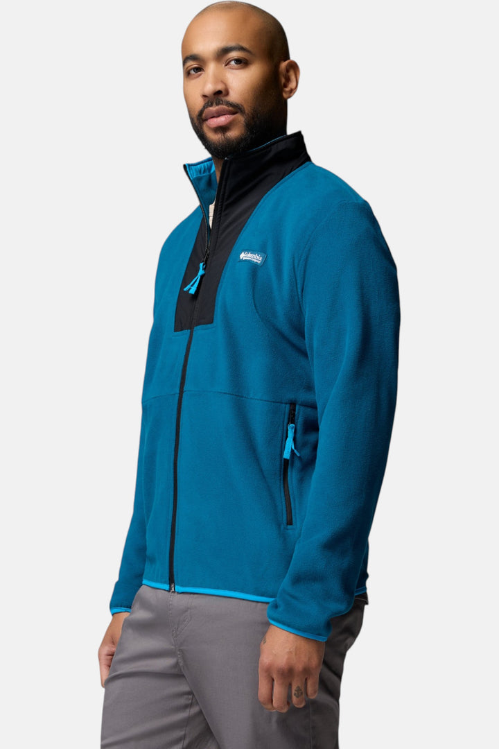 Men's blue Columbia full-zip fleece jacket side view with stand collar and zipper