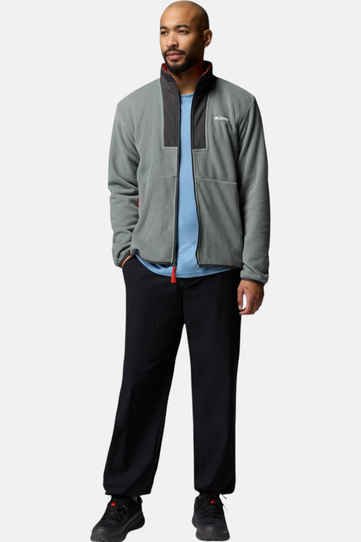 Full-zip fleece jacket in gray with red zipper accents, long sleeves