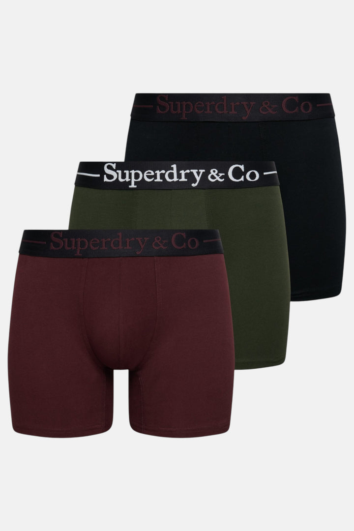 Triple pack boxer briefs showing black, olive green, and burgundy pairs