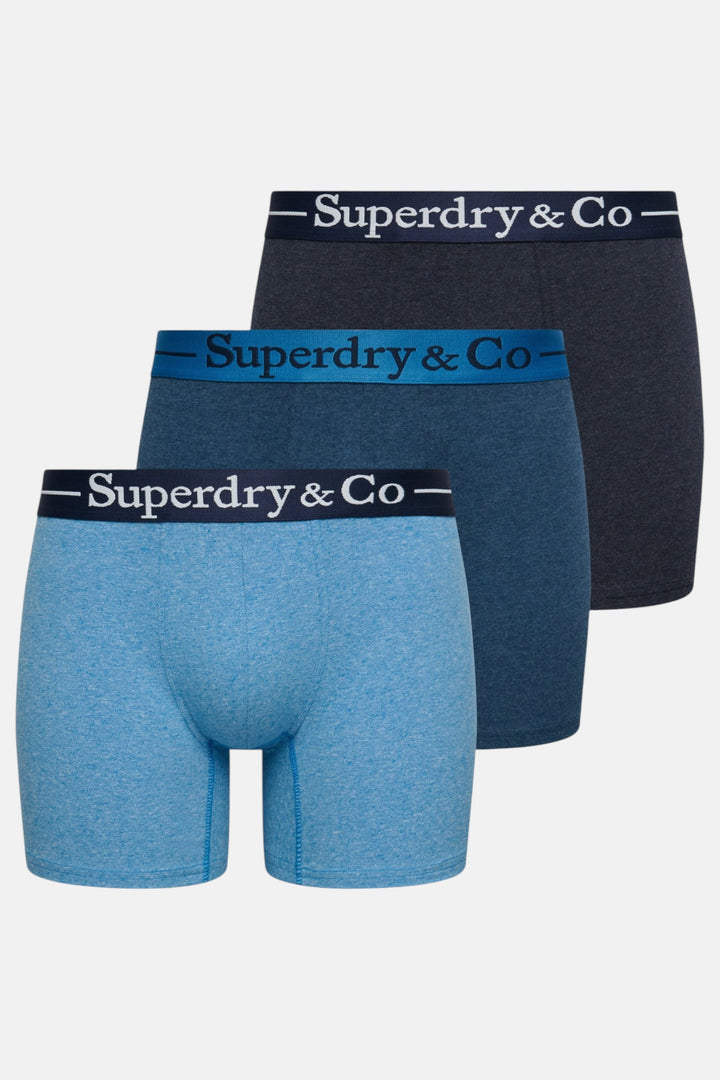 Three-pack boxer briefs in navy and blue marl, Superdry & Co logo waistbands.