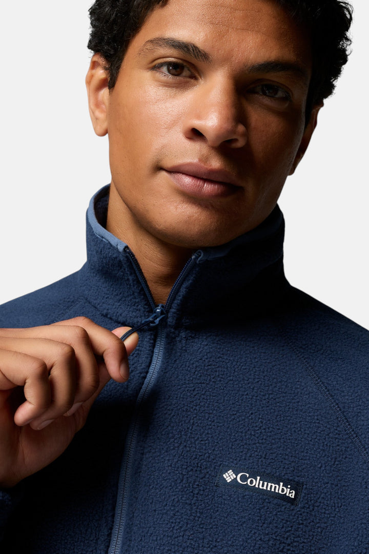 Columbia half-zip fleece in collegiate navy, close-up of zipper and logo