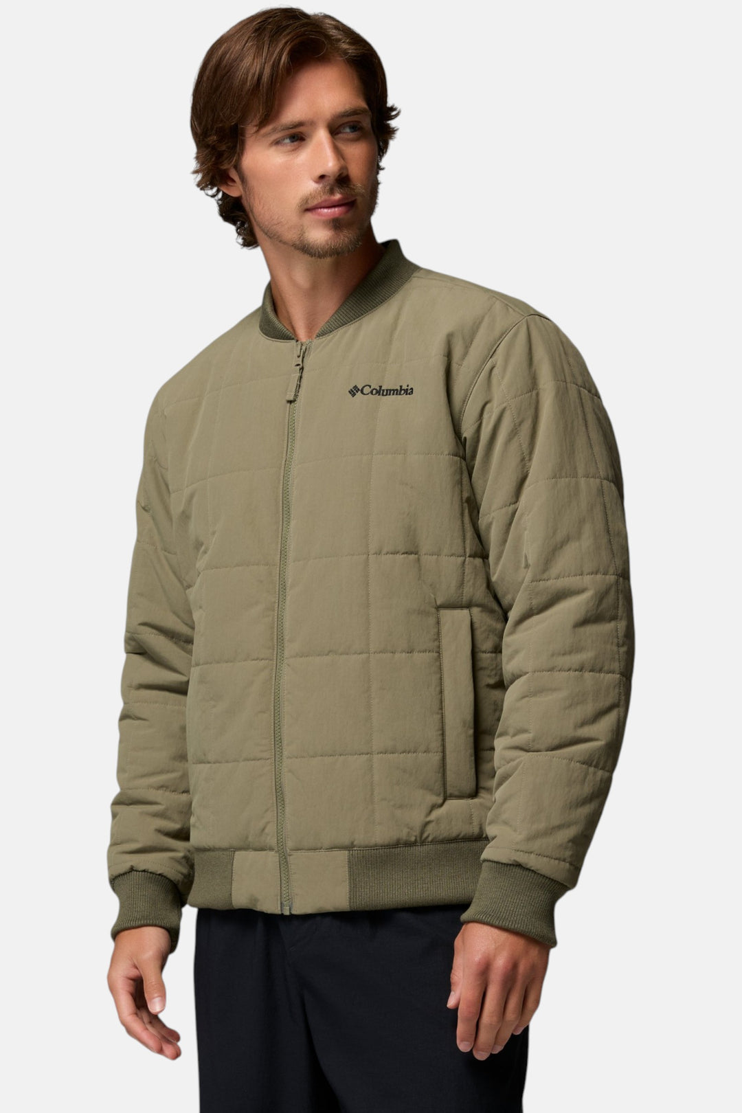 Men's stone green bomber jacket, side view with quilted body and ribbed cuffs