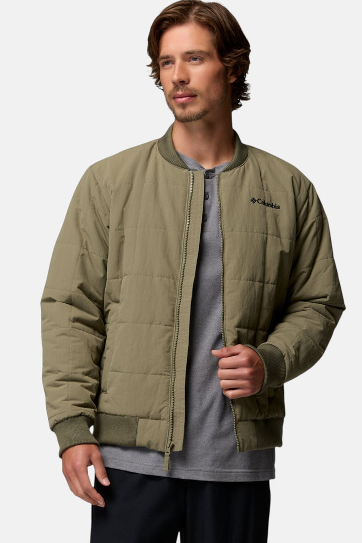 Men's stone green bomber jacket with zip front, quilted pockets, and Columbia logo