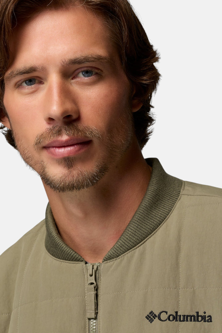 Men's bomber jacket in stone green with zip front, ribbed collar, and Columbia logo