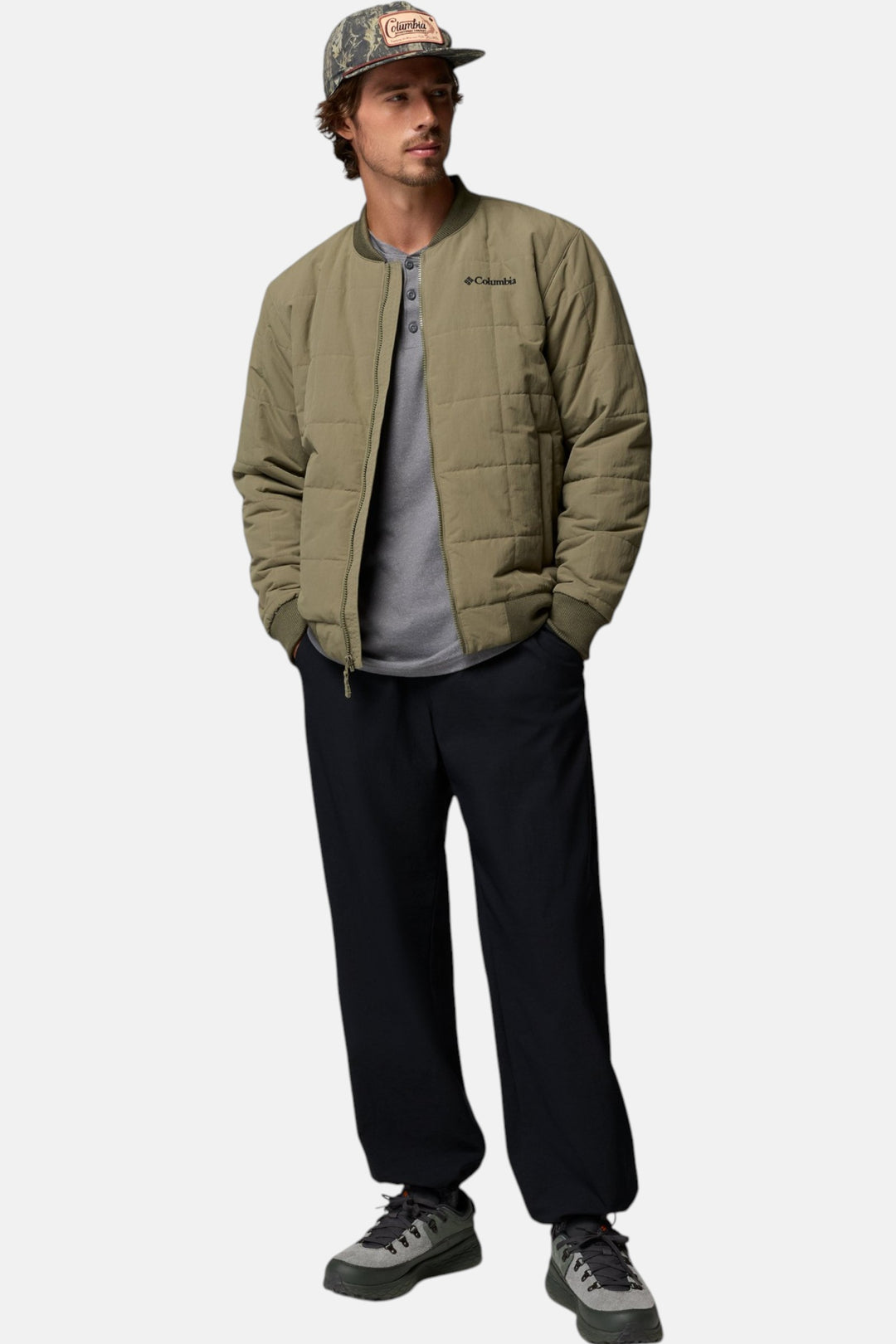 Men's stone green bomber jacket with stand collar, zip front, and quilted sleeves