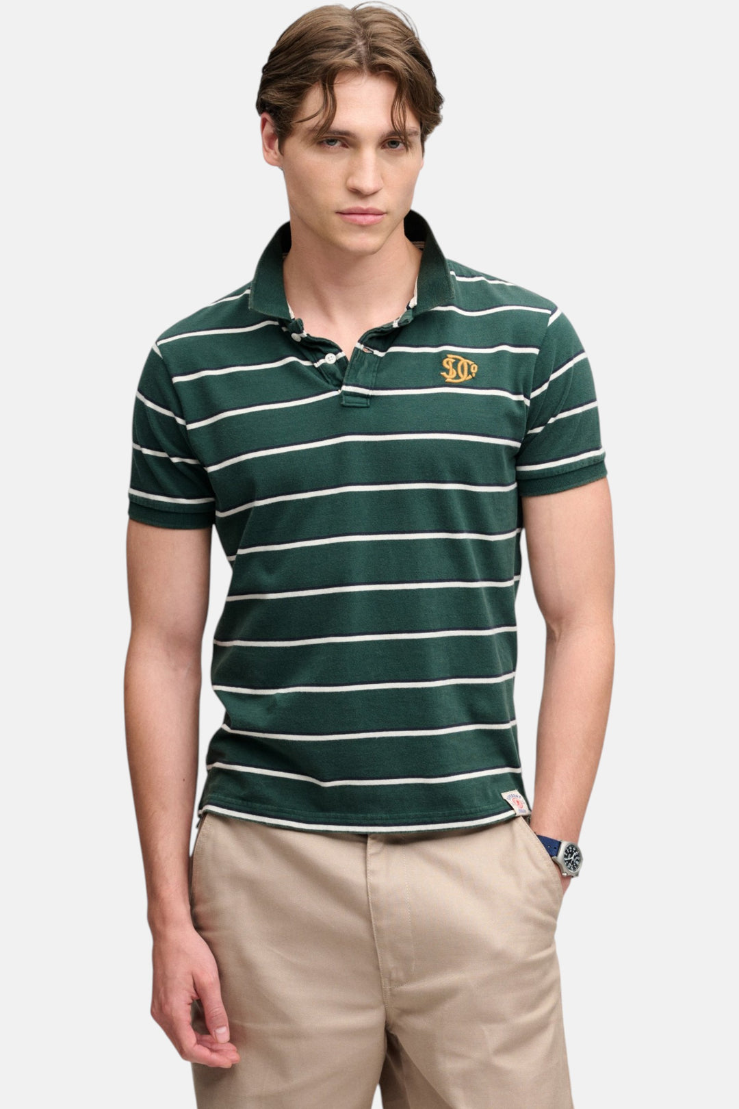 Green striped jersey polo shirt with collar, button placket and chest logo