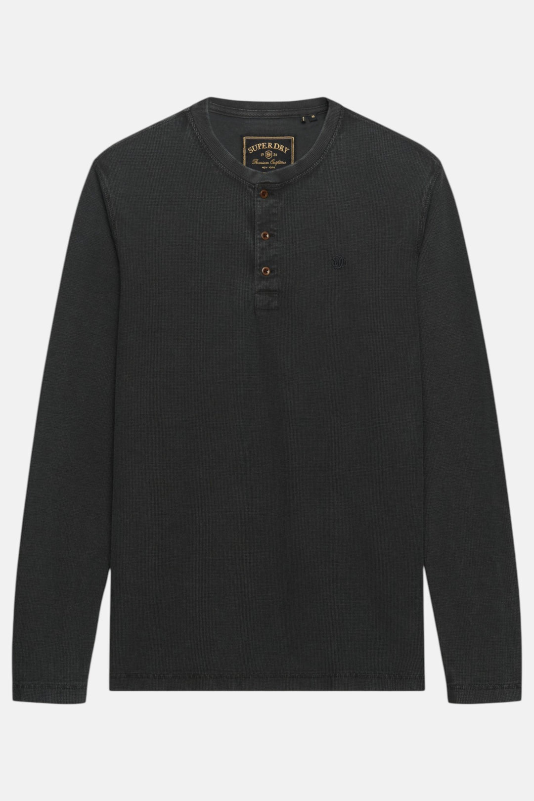 Men's washed black waffle-knit long-sleeve henley top with button placket
